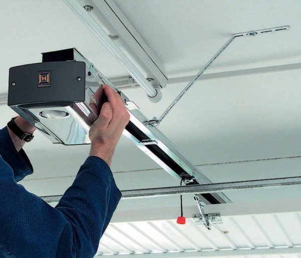 Technician performing garage door opener repair service for Bee Ridge Garage Door Repair, ensuring smooth and secure operation.