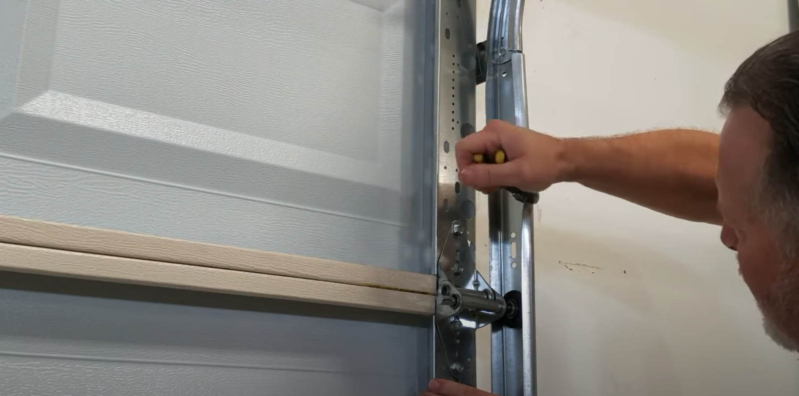 Noisy garage door fix service of Bee Ridge Garage Door Repair expert technicians.